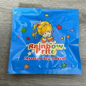 RAINBOW BRITE MYSTERY BAG PADDED NYLON CHARACTER BAG CHARMS